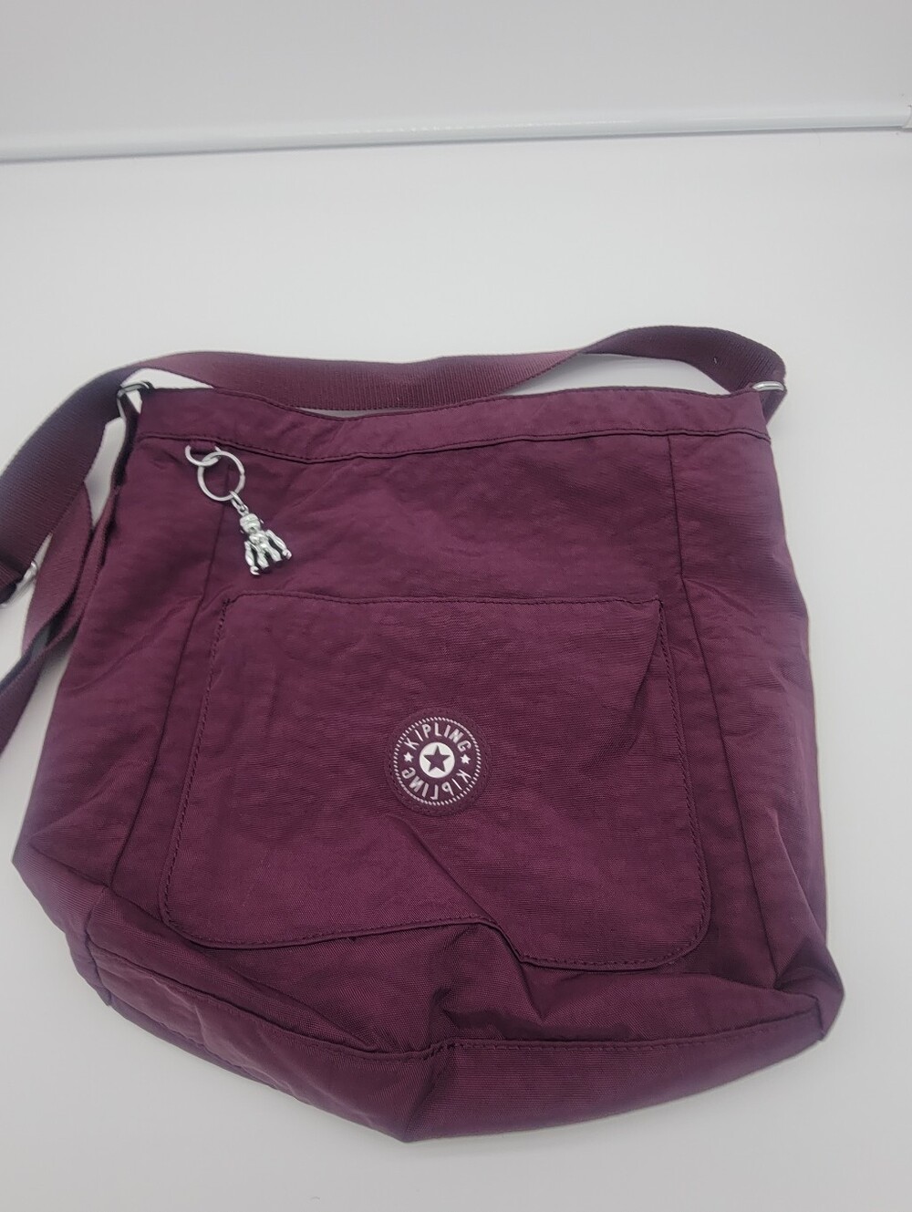 Kipling Plum Crossbody Bag with Monkey Charm